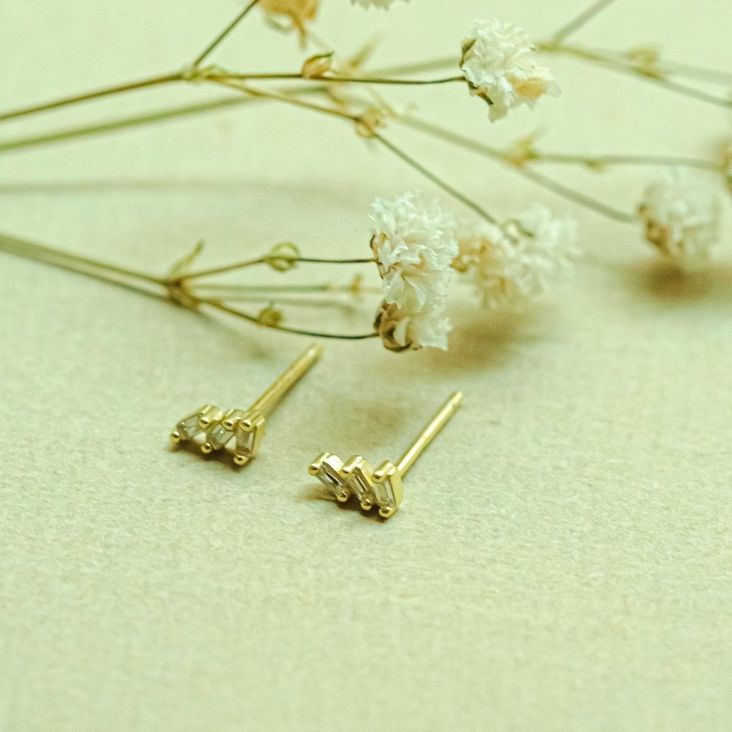 Miu Tiny Triple CZ Baguette Gold Stud Earrings