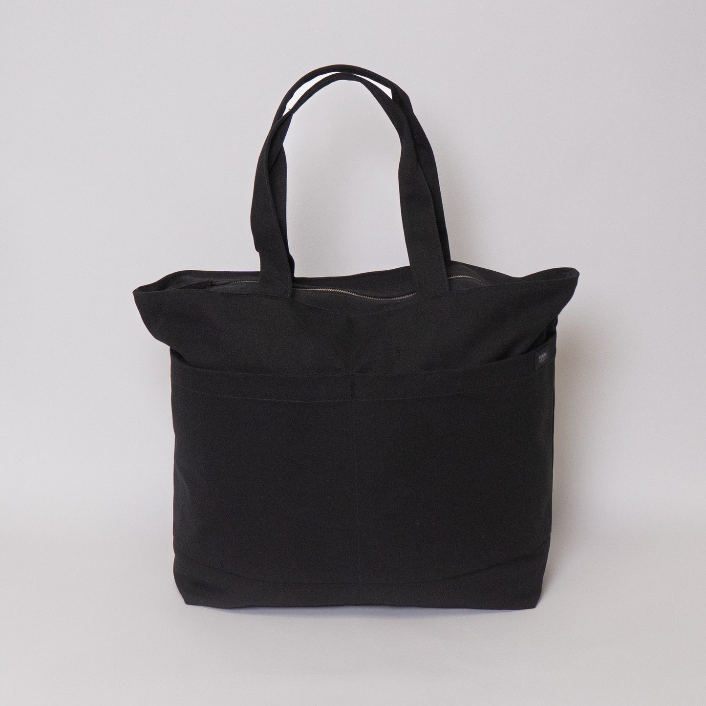 Tote bags with trolley sleeve