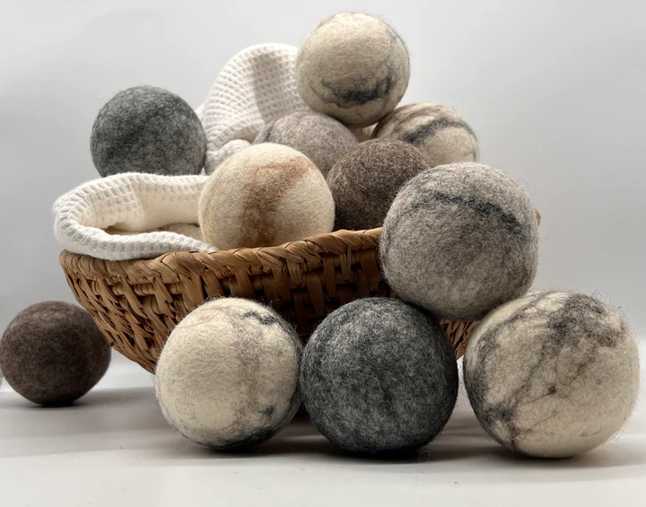 Eco-Friendly Laundry Hacks: Choosing Dryer Balls Over Fabric Softeners | Verte Mode